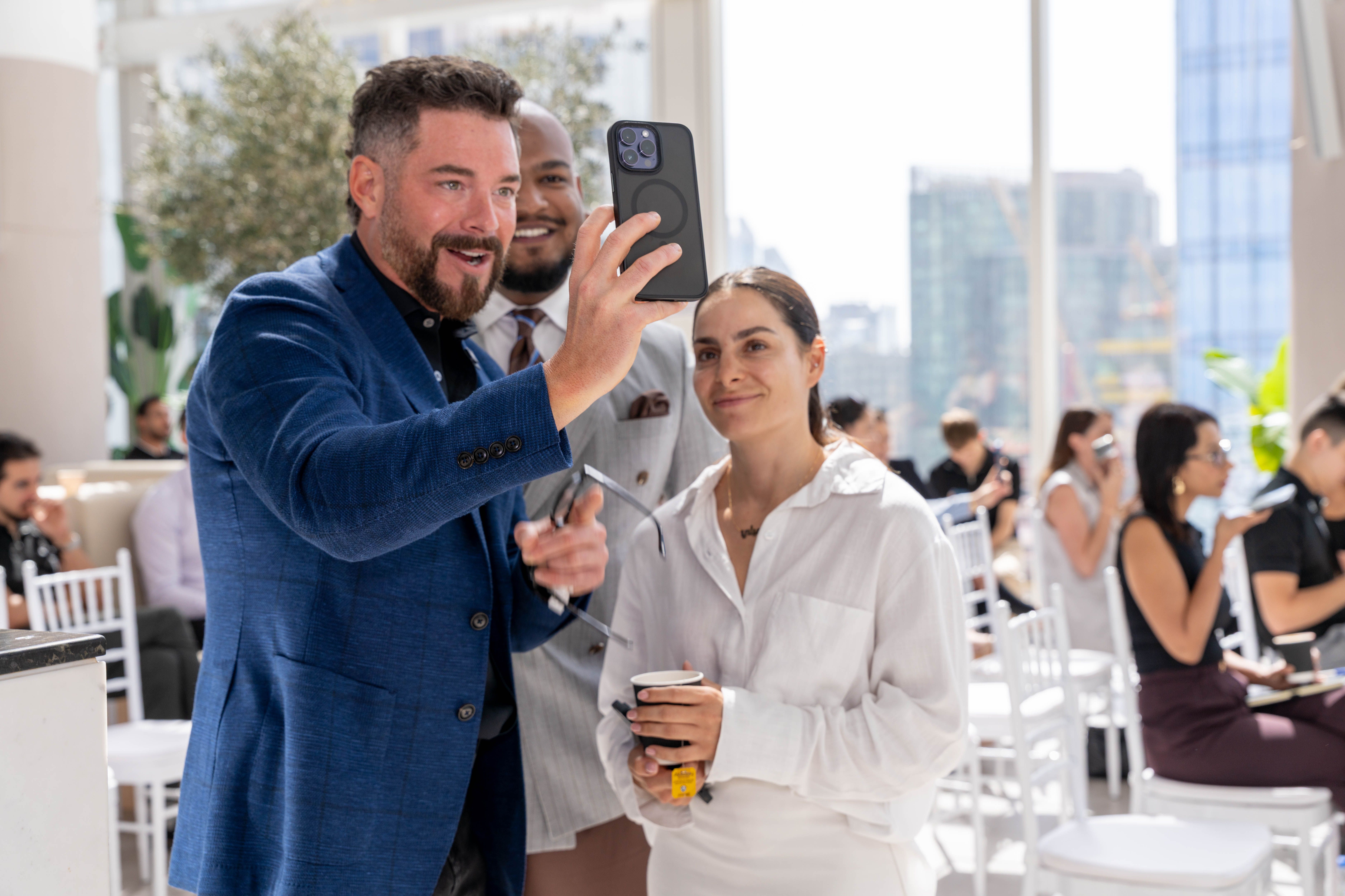 Buck with event attendees