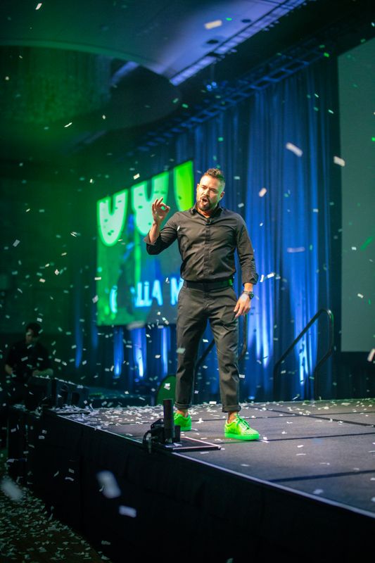 Buck on stage with confetti